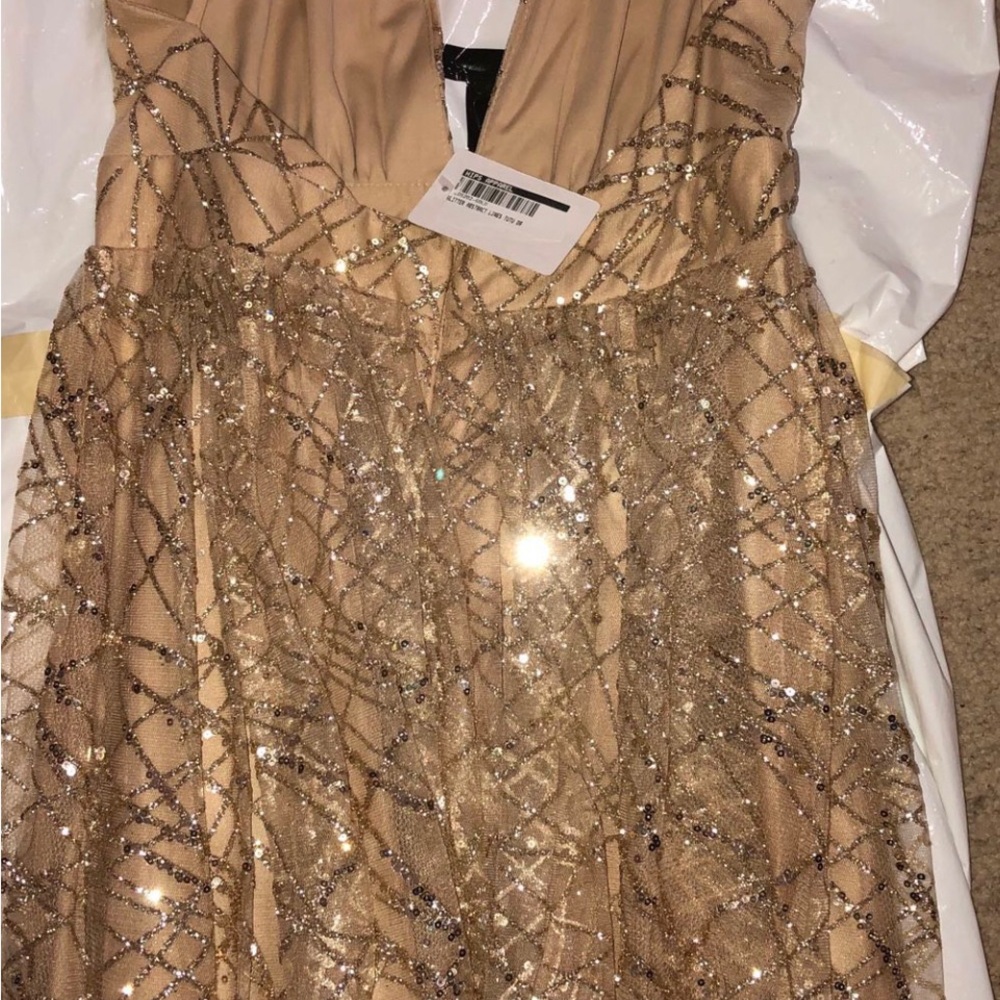 Gold glitter abstract tutu dress for prom or any special occasion.